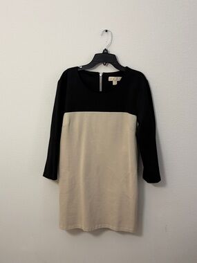 Michaels Black Dress with Beige Label Accent